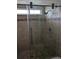 Walk-in shower with glass enclosure and modern fixtures at 212 Poinciana Ln, Largo, FL 33770