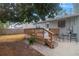 Wooden deck with stairs and lattice detail near house at 2579 Madrid S Way, St Petersburg, FL 33712