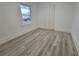 Bright bedroom with vinyl flooring and a closet at 4736 20Th N St, St Petersburg, FL 33714