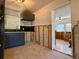 New kitchen with dark gray cabinets and black tile backsplash at 5018 Chancellor Ne St, St Petersburg, FL 33703