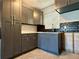 Newly installed kitchen with dark gray cabinets at 5018 Chancellor Ne St, St Petersburg, FL 33703