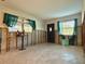 Under renovation living room with new front door at 5018 Chancellor Ne St, St Petersburg, FL 33703