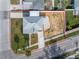Aerial view of a single Gathering home and surrounding lot at 7951 Gulf Blvd, St Pete Beach, FL 33706