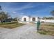 Newly renovated home with a spacious yard and driveway at 7951 Gulf Blvd, St Pete Beach, FL 33706