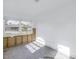 A bright bedroom undergoing renovation with exposed walls and flooring at 7951 Gulf Blvd, St Pete Beach, FL 33706
