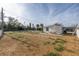 Newly renovated home with a gravel backyard and covered patio at 7951 Gulf Blvd, St Pete Beach, FL 33706