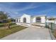 Newly renovated home with a spacious yard and driveway at 7951 Gulf Blvd, St Pete Beach, FL 33706