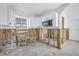 A kitchen in the midst of a remodel, with exposed walls and utilities at 7951 Gulf Blvd, St Pete Beach, FL 33706