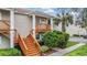Two story condo building with private balcony and stairs at 9016 Shallowford Ln # 202, Port Richey, FL 34668