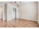 Large bedroom with wood flooring and double door closet at 9016 Shallowford Ln # 202, Port Richey, FL 34668