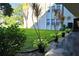 Neatly landscaped grounds with lush lawn and walkways at 9940 47Th N Ave # 116, St Petersburg, FL 33708