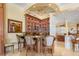 Custom bar with granite countertop and seating for three at 101 12Th E St, Tierra Verde, FL 33715