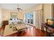 Main bedroom with water views and sitting area at 101 12Th E St, Tierra Verde, FL 33715