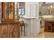 Partial view of a kitchen with custom cabinetry and granite countertops at 101 12Th E St, Tierra Verde, FL 33715