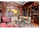 Spacious library with built-in shelving and comfortable seating at 101 12Th E St, Tierra Verde, FL 33715