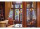 Library with a comfortable seating area and a view of the water at 101 12Th E St, Tierra Verde, FL 33715