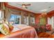 Spacious main bedroom with water views and luxurious bedding at 101 12Th E St, Tierra Verde, FL 33715