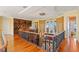 Spacious home office with built-in bookcases and hardwood floors at 101 12Th E St, Tierra Verde, FL 33715