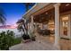 Covered outdoor kitchen with water views at 101 12Th E St, Tierra Verde, FL 33715