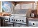 Stainless steel Viking grill and outdoor kitchen with granite countertops at 101 12Th E St, Tierra Verde, FL 33715