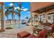 Inviting pool and patio with seating area, offering water views at 101 12Th E St, Tierra Verde, FL 33715