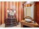 Stylish powder room with a unique sink and vanity at 101 12Th E St, Tierra Verde, FL 33715