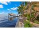 Landscaped waterfront property with a boat dock and stunning views at 101 12Th E St, Tierra Verde, FL 33715