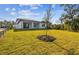 Spacious backyard with grassy area and privacy fencing at 12620 Glenn Creek Dr, Riverview, FL 33569