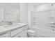 Simple bathroom with a shower/tub combo and white vanity at 12620 Glenn Creek Dr, Riverview, FL 33569