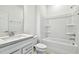 Clean bathroom, featuring a shower/tub combo and vanity with a granite countertop at 12620 Glenn Creek Dr, Riverview, FL 33569
