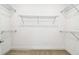 Walk-in closet with wire shelving for ample storage at 12620 Glenn Creek Dr, Riverview, FL 33569