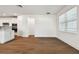 Spacious living room with hardwood floors and lots of natural light at 12620 Glenn Creek Dr, Riverview, FL 33569