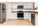 Modern kitchen with stainless steel appliances at 1537 Excalibur St, Holiday, FL 34690