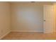 Empty bedroom with tile floors and an open door at 1537 Excalibur St, Holiday, FL 34690