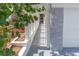 White picket fence and gray stone entry gate at 1537 Excalibur St, Holiday, FL 34690