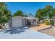 Nice curb appeal with gray stone and a covered porch at 1537 Excalibur St, Holiday, FL 34690
