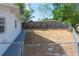 Large backyard with chain link fence and room to play at 1537 Excalibur St, Holiday, FL 34690