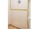 Shower stall with beige and yellow tile and worn grout at 1537 Excalibur St, Holiday, FL 34690