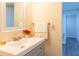 Clean bathroom with gray vanity and shower at 1537 Excalibur St, Holiday, FL 34690