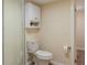 Small bathroom with toilet and shower at 1537 Excalibur St, Holiday, FL 34690
