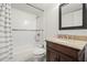 Bathroom with a bathtub, shower, and granite vanity at 201 W Laurel St # 609, Tampa, FL 33602