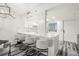 Modern white kitchen with island and bar stools at 201 W Laurel St # 609, Tampa, FL 33602