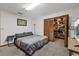Spacious bedroom with large closet and comfortable bed at 223 S Riverhills Dr, Temple Terrace, FL 33617