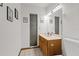 Clean bathroom with sink, toilet, and wood vanity at 223 S Riverhills Dr, Temple Terrace, FL 33617
