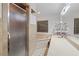 Bathroom with a shower, bathtub, and double vanity at 223 S Riverhills Dr, Temple Terrace, FL 33617