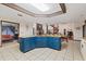 Spacious kitchen with island, granite countertops, and blue cabinetry at 223 S Riverhills Dr, Temple Terrace, FL 33617