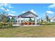 Community pavilion with seating area and surrounding landscaping at 28732 Rambutan Dr, Wesley Chapel, FL 33543