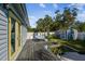 Relaxing deck with seating area and lush plants at 311 N Bradford Ave, Tampa, FL 33609