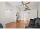 Home office with hardwood floors and ceiling fan at 604 S Tampania Ave # C, Tampa, FL 33609