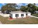 Attractive curb appeal with well-maintained landscaping and a freshly painted exterior at 6269 Skyline Ct, Spring Hill, FL 34606